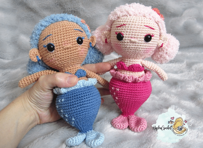 Collection of crochet mermaid dolls made with various yarns including Scheepjes Catona, Phildar Phil Douce, and Cheval Blanc Comète